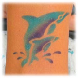 Dolphins Tattoo by Big Daddy Body Art